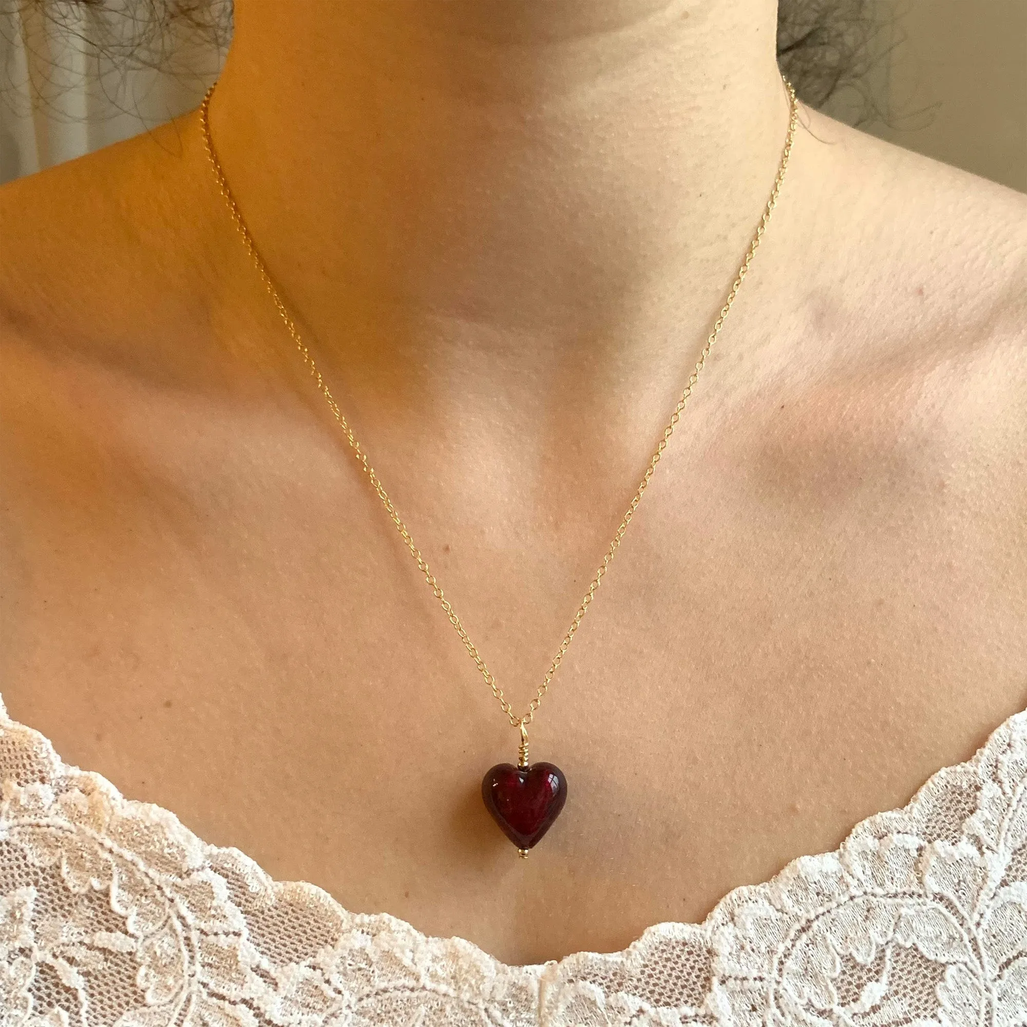 Necklace with dark red Murano glass small heart pendant on gold cable chain